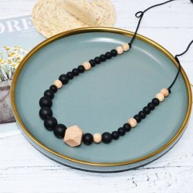 Collier d'allaitement (ou de portage) en silicone - Noir & Bois Irréversible Bijoux
